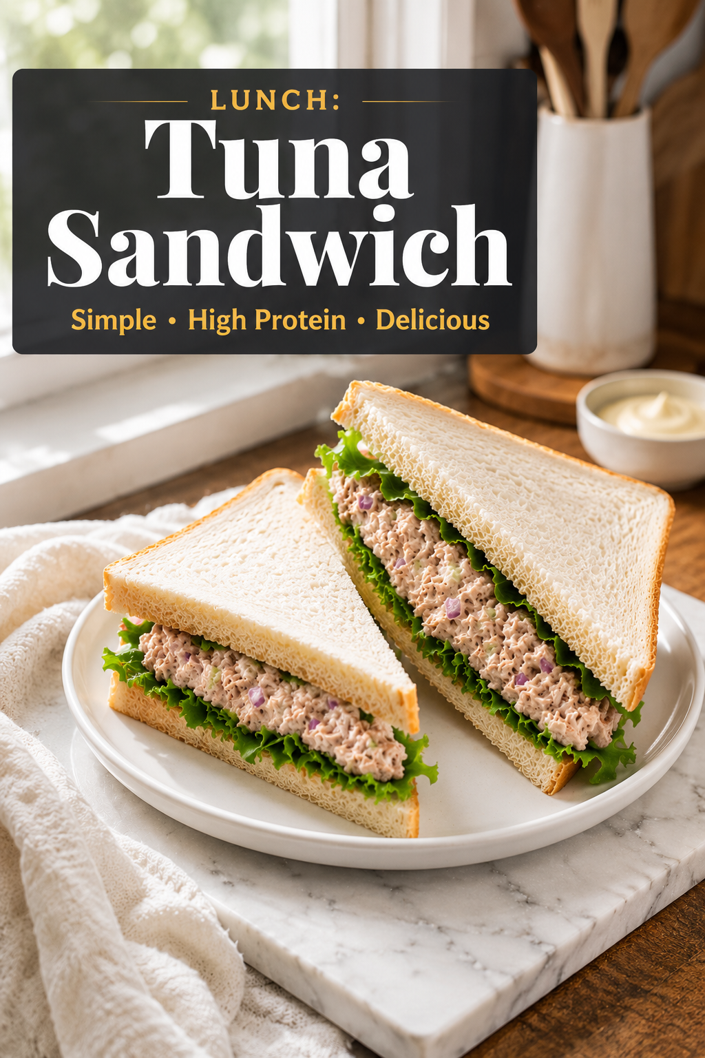 Pinterest food blog poster featuring a high protein tuna sandwich made with whole grain bread, tuna, mayonnaise, and fresh salad greens, healthy lunch recipe for busy professionals in a bright natural light kitchen.
