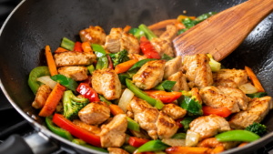 Chicken cooking without sticking to the pan during a homemade stir fry